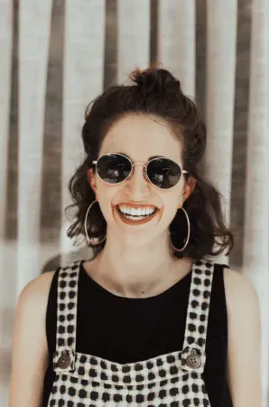 Confident woman smiling.